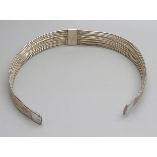 953 - A designer silver choker, 39g, 112mm wide