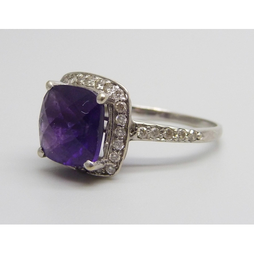 955 - A 14ct white gold, chequer cut amethyst and diamond ring, 3.9g, Q