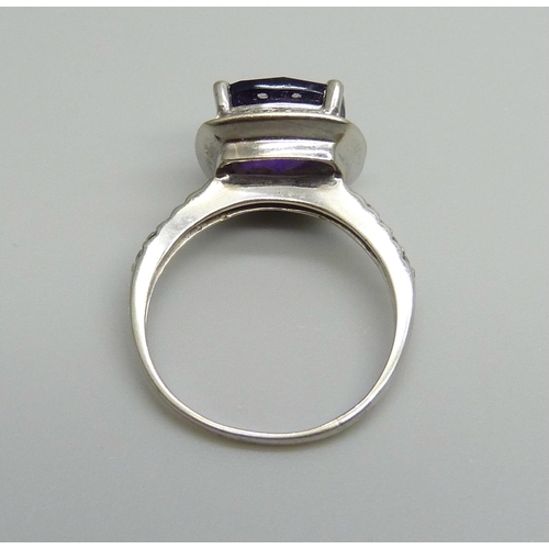 955 - A 14ct white gold, chequer cut amethyst and diamond ring, 3.9g, Q