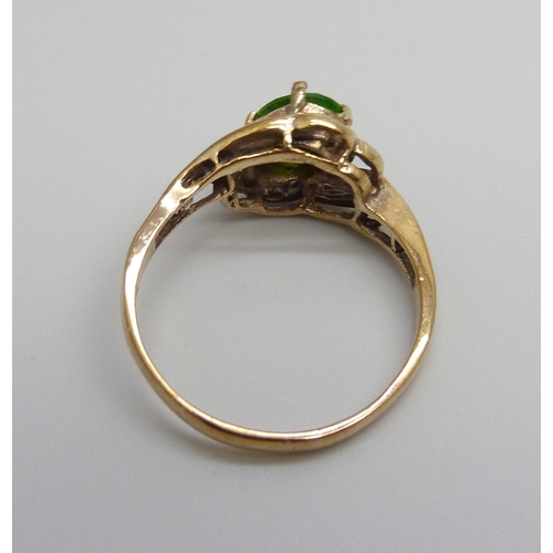 956 - A yellow metal and green stone ring, marked 14k, 3.5g, R/S