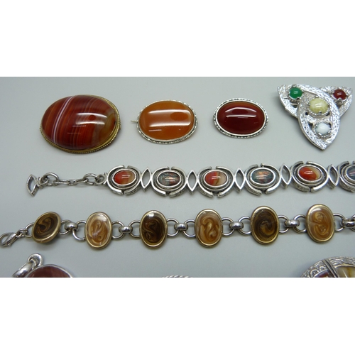 958 - Nine brooches including agate set and two silver mounted, a silver mounted pendant, a Miracle bracel... 