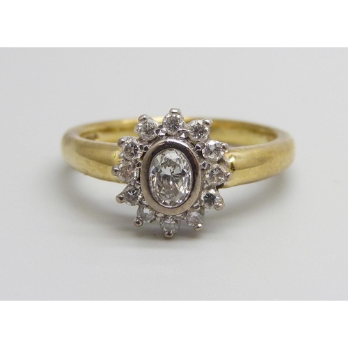 959 - An 18ct gold and diamond cluster ring, 0.50ct weight marked on the shank, 5.5g, P