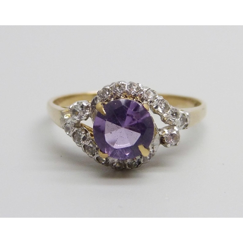 961 - An amethyst and white stone set ring, marked 375, 1.8g, O