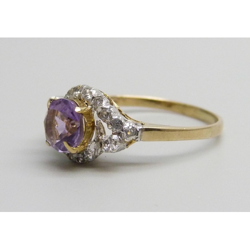 961 - An amethyst and white stone set ring, marked 375, 1.8g, O