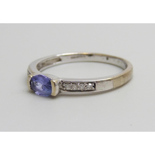 962 - A 9ct white gold, tanzanite and zircon ring, 2.1g, P