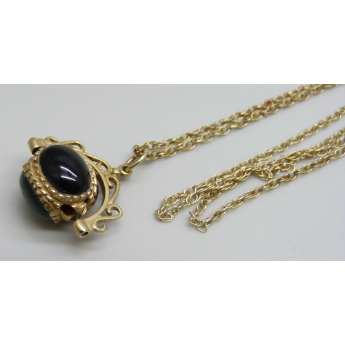 965 - A 9ct gold mounted fob on a 9ct gold chain, 5.1g