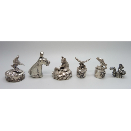 967 - A 925 silver dog rattle, four pill boxes including one mounted with a model fox, also a small novelt... 