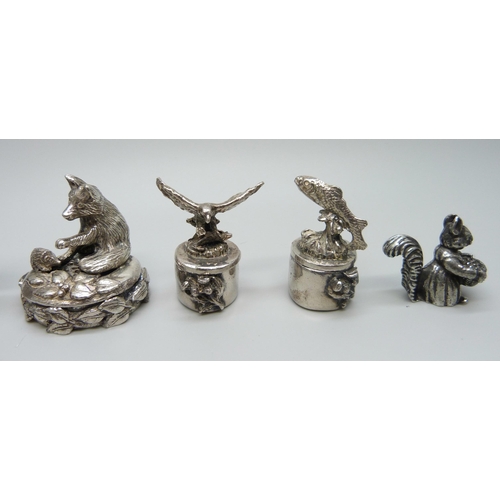 967 - A 925 silver dog rattle, four pill boxes including one mounted with a model fox, also a small novelt... 