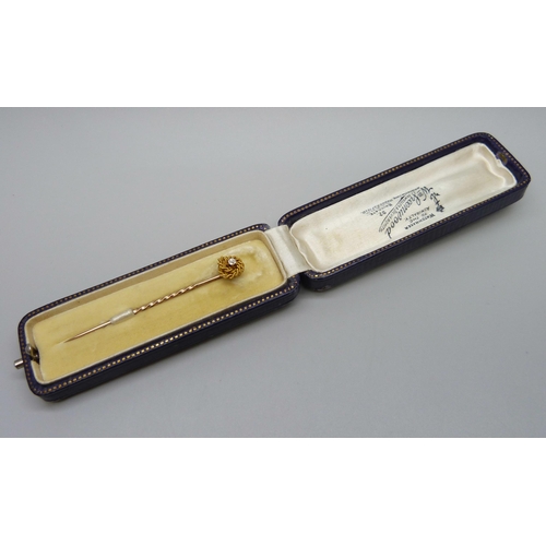 969 - A 15ct gold and diamond stick pin, cased, 1.5g