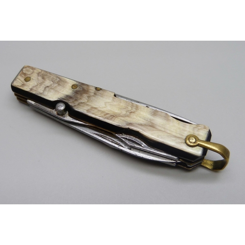 976 - A multi-blade/tool pocket knife with horn handle, 'made in France'