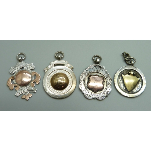 989 - Four silver fob medals with applied gold detail, 39.4g