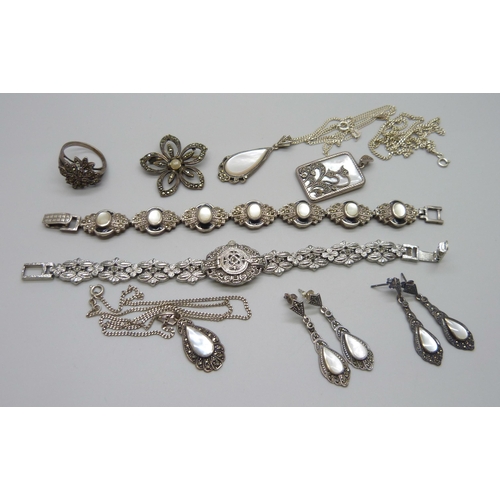 991 - Silver jewellery including a silver bracelet, three silver chains, two pairs of silver earrings, a s... 