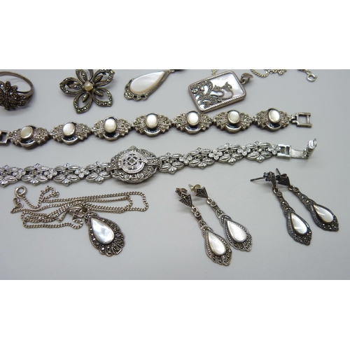 991 - Silver jewellery including a silver bracelet, three silver chains, two pairs of silver earrings, a s... 