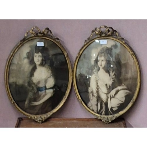 319 - A pair of Victorian oval prints, prints of ladies, framed