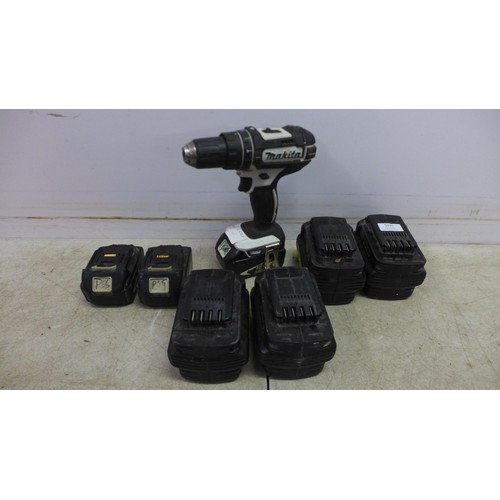 5035 - A Makita 18V cordless drill with 7 various drill batteries (18v and 24V) including DeWalt