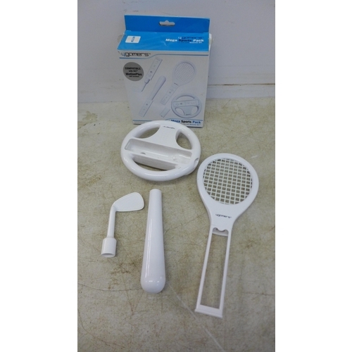 5070 - A Nintendo Wii and various accessories including a mega sports pack, a steering wheel, a copy of Wii... 