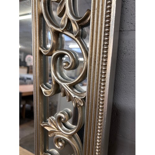 3077A - A gold gilt antique style mirror (crack in the bottom left)