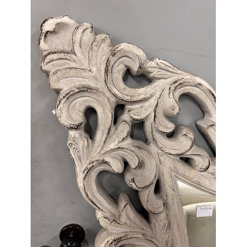 3094A - A carved ornate distressed white mirror