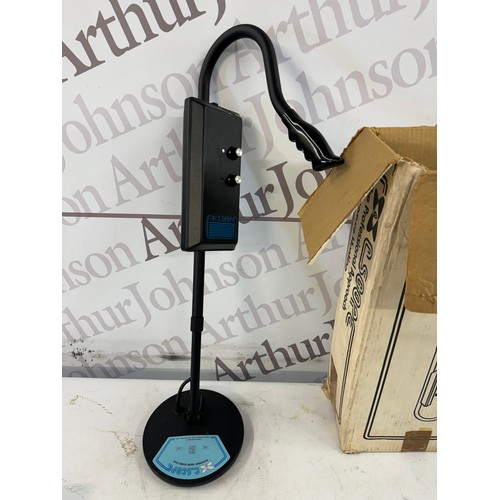 5285A - A C Scope IB/TR metal detector with instructions and a fishing reel