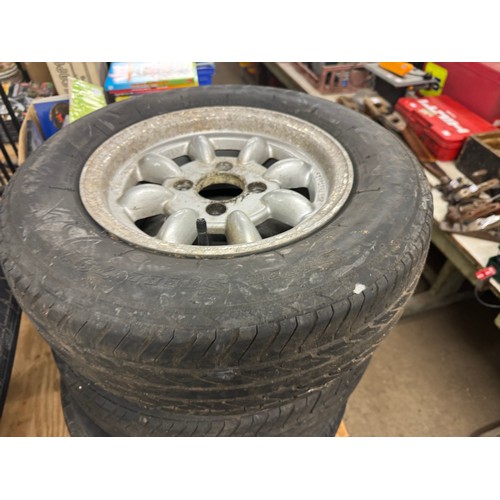 5329 - A set of four steel wheels and four tyres off a Nissan NV200 van