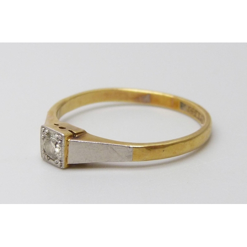 7004 - An 18ct gold and platinum diamond solitaire ring, 2.1g, M