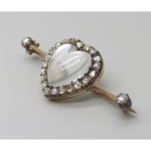 7007 - A yellow metal heart shaped moonstone and diamond brooch, 3.6cm, 3.5g