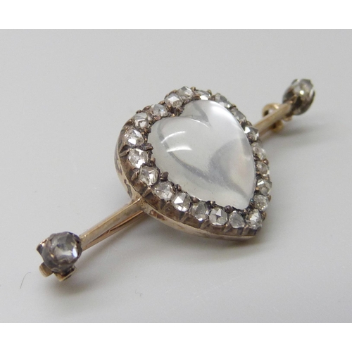 7007 - A yellow metal heart shaped moonstone and diamond brooch, 3.6cm, 3.5g