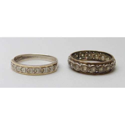 7008 - A 9ct gold and silver ring, N, and an unmarked eternity ring, J/K, 3.9g total