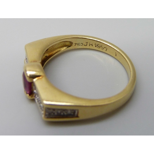 7012 - An 18ct gold ring set with a central ruby and diamonds, 5.5g, N/O