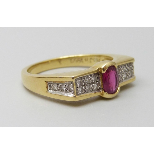 7012 - An 18ct gold ring set with a central ruby and diamonds, 5.5g, N/O