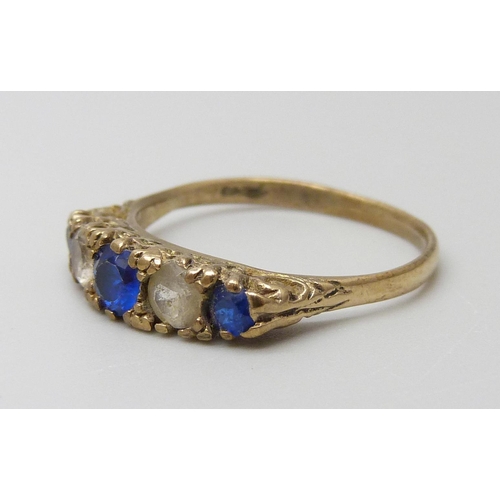 7016 - A 9ct gold blue and white spinel set ring, 2.2g, Q