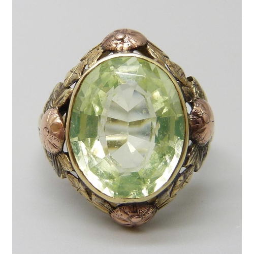 7027 - A Russian 14ct gold Art Nouveau ring set with a synthetic oval green spinel stone, 6g, M