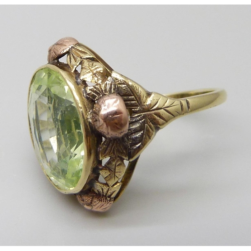 7027 - A Russian 14ct gold Art Nouveau ring set with a synthetic oval green spinel stone, 6g, M