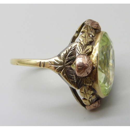 7027 - A Russian 14ct gold Art Nouveau ring set with a synthetic oval green spinel stone, 6g, M