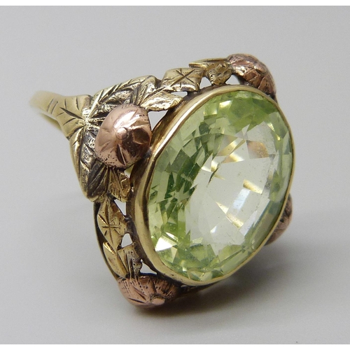 7027 - A Russian 14ct gold Art Nouveau ring set with a synthetic oval green spinel stone, 6g, M