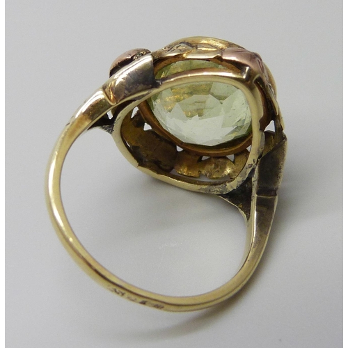 7027 - A Russian 14ct gold Art Nouveau ring set with a synthetic oval green spinel stone, 6g, M