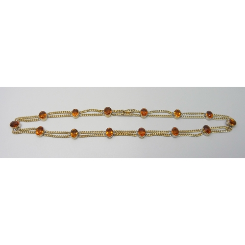 7028 - A 9ct gold citrine set double chain necklace, 20.2g, 39.5cm