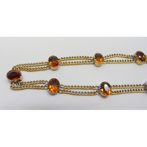 7028 - A 9ct gold citrine set double chain necklace, 20.2g, 39.5cm