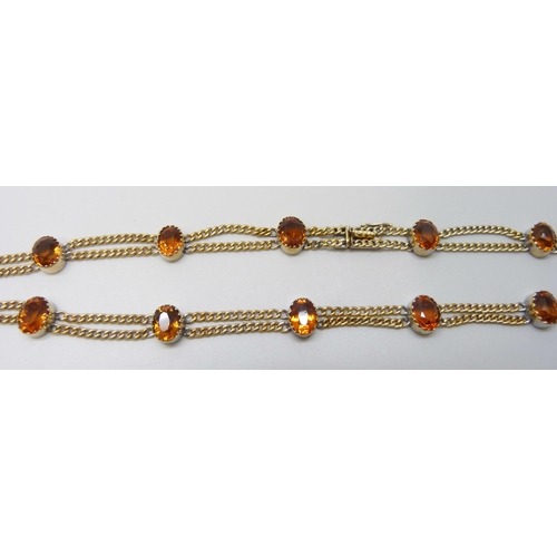 7028 - A 9ct gold citrine set double chain necklace, 20.2g, 39.5cm