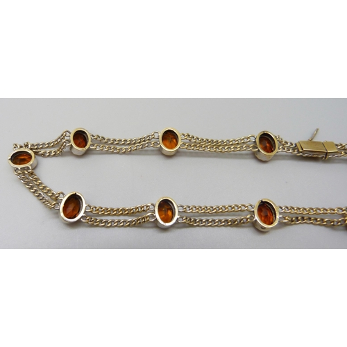 7028 - A 9ct gold citrine set double chain necklace, 20.2g, 39.5cm