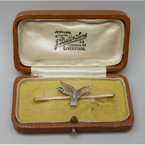 7033 - A 9ct gold and enamel pheasant design bar brooch, 2.8g, 5cm