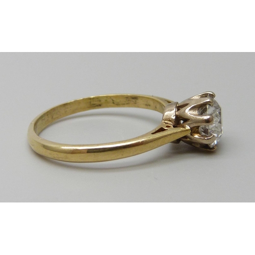 7039 - An 18ct gold diamond solitaire ring, approximately 0.6ct, 3g, N