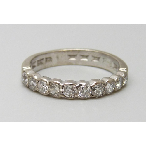 7047 - A white metal and old cut diamond set half eternity ring, ten diamonds, total diamond weight estimat... 