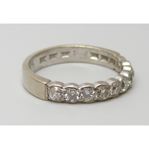 7047 - A white metal and old cut diamond set half eternity ring, ten diamonds, total diamond weight estimat... 