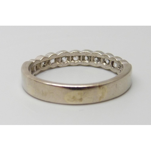 7047 - A white metal and old cut diamond set half eternity ring, ten diamonds, total diamond weight estimat... 