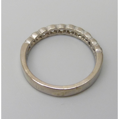 7047 - A white metal and old cut diamond set half eternity ring, ten diamonds, total diamond weight estimat... 