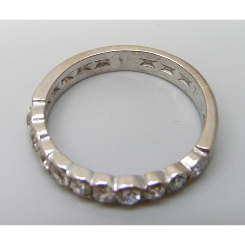 7047 - A white metal and old cut diamond set half eternity ring, ten diamonds, total diamond weight estimat... 