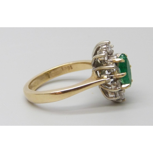 7057 - An 18ct gold, marquise cut emerald and diamond ring, very slight chip to emerald, 4.3g, L