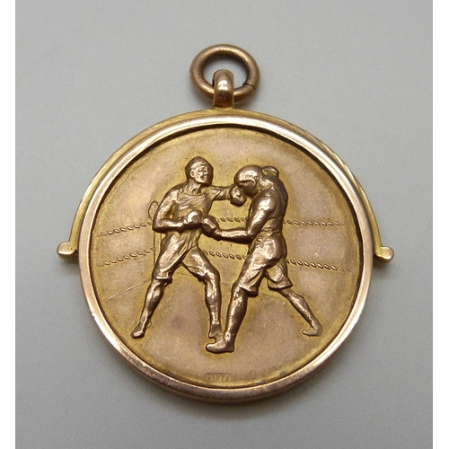 7058 - A 9ct gold Staffs Constabulary Boxing Tournament medal, 1929 Contest, cased, 15.2g