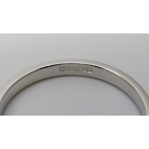 7063 - A platinum 2mm band ring, 2.8g, M